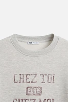 SWEAT À INSCRIPTION IMPRIMÉE