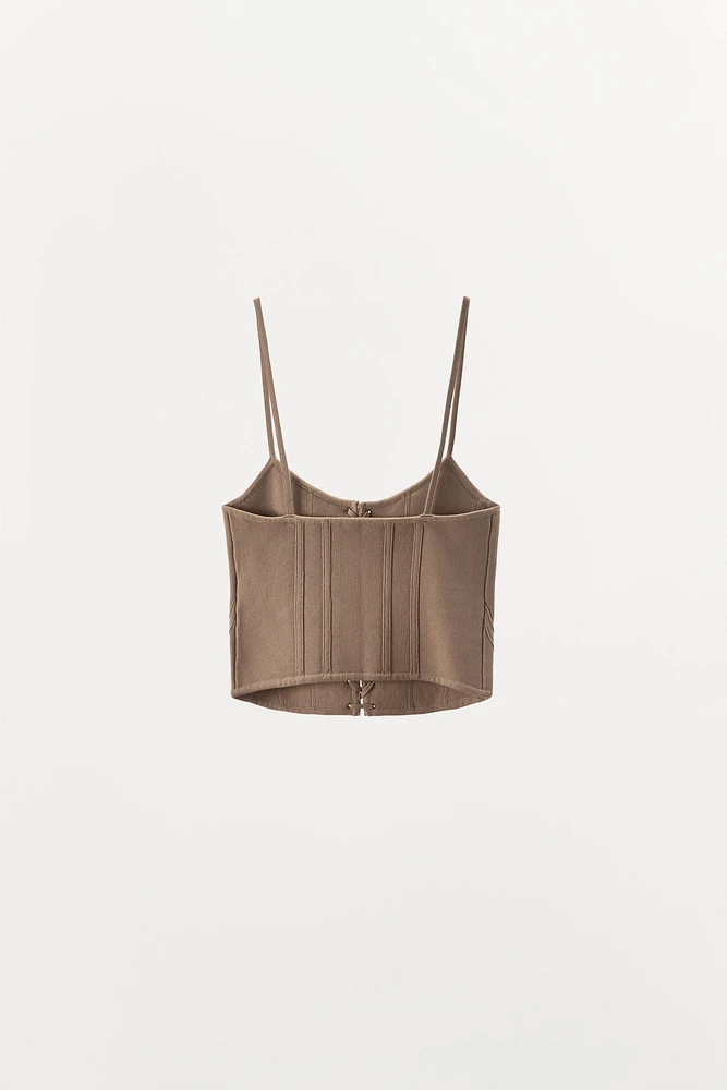 CORSET EN MAILLE À LACETS