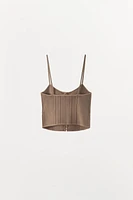 CORSET EN MAILLE À LACETS