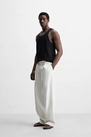 RELAXED FIT PLEATED PANTS
