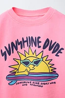 T-SHIRT TEINT EN PIÈCE IMPRIMÉ