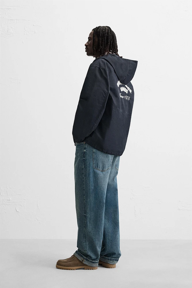 BLOUSON TECHNIQUE À CAPUCHE