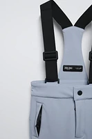 PANTALON À BRETELLES COUPE-VENT ET DÉPERLANT RECCO® SYSTEM SKI COLLECTION