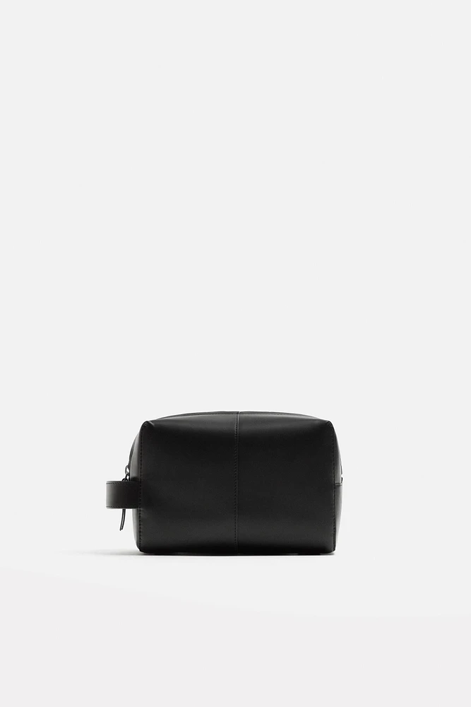 TROUSSE EN CUIR