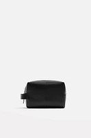 TROUSSE EN CUIR