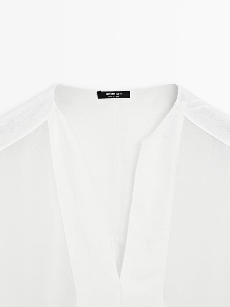 Flowing linen blend blouse with seam details