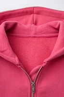 SWEAT À CAPUCHE ET LOGO