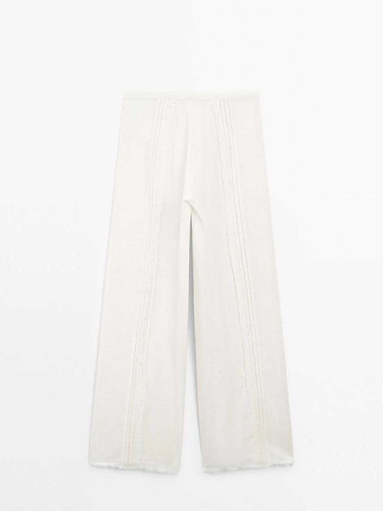 Pantalon avec broderies en coton mélangé