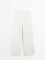 Pantalon avec broderies en coton mélangé