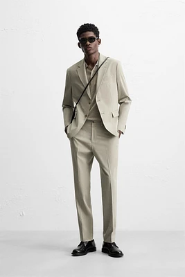 TEXTURED SUIT PANTS