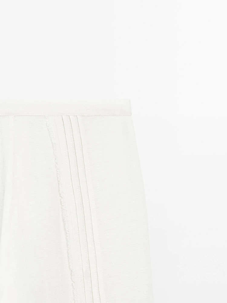 Pantalon avec broderies en coton mélangé