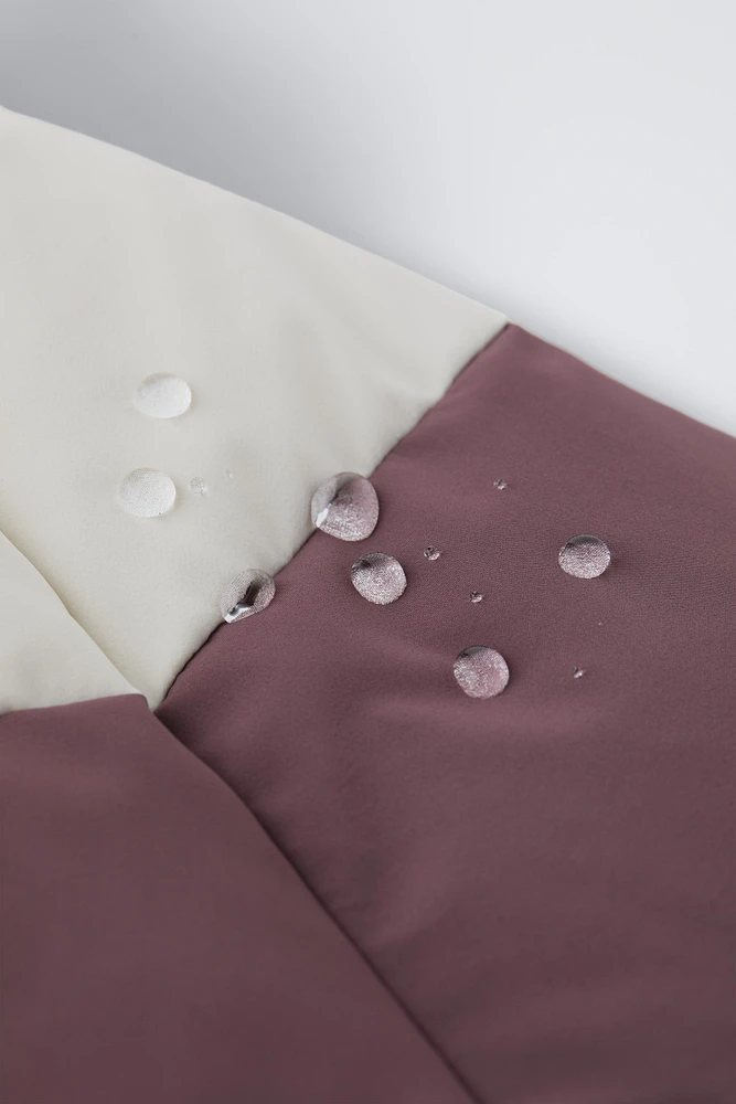 WINDPROOF AND WATER REPELLENT DOWN JUMPSUIT RECCO® SYSTEM SKI COLLECTION