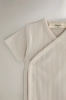 CHILDREN’S SET OF BODYSUITS