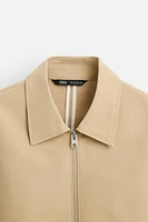 PIPED SEAM JACKET