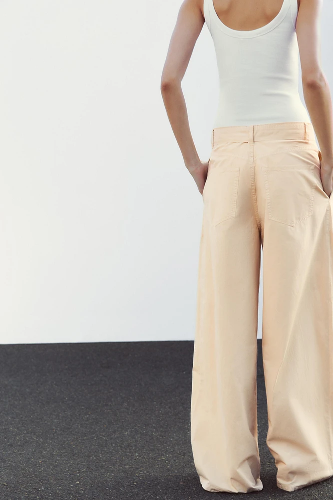 PLEATED BELTED PANTS