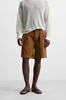 RELAXED FIT PLEATED BERMUDA SHORTS
