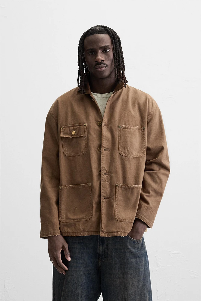 VESTE DÉLAVÉE AVEC COL EN CONTRASTE