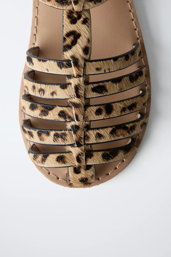 SANDALES STYLE PLAGE EN CUIR ANIMAL PRINT