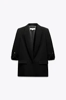 VESTE À MANCHES RETROUSSÉES