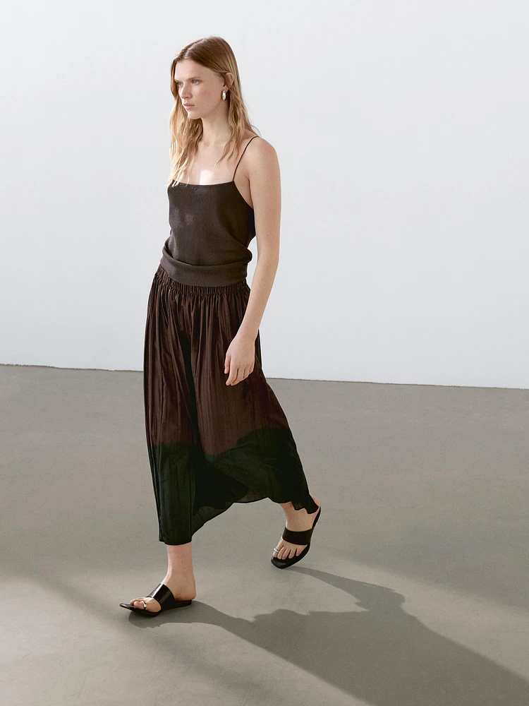 Long flowing pleated skirt