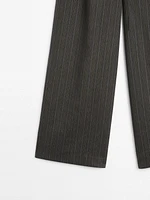 Multi-stripe trousers with belt detail