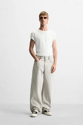 ASYMMETRIC SEAM BAGGY FIT JEANS
