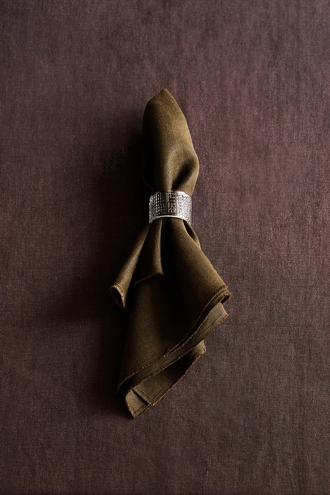 SET OF GLASS NAPKIN RINGS (SET OF 4)