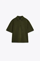 TOP À COL POLO AVEC ZIP
