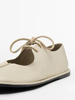 Ballet flats with instep knot