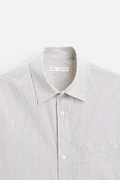 CHEMISE À CARREAUX AVEC POCHE