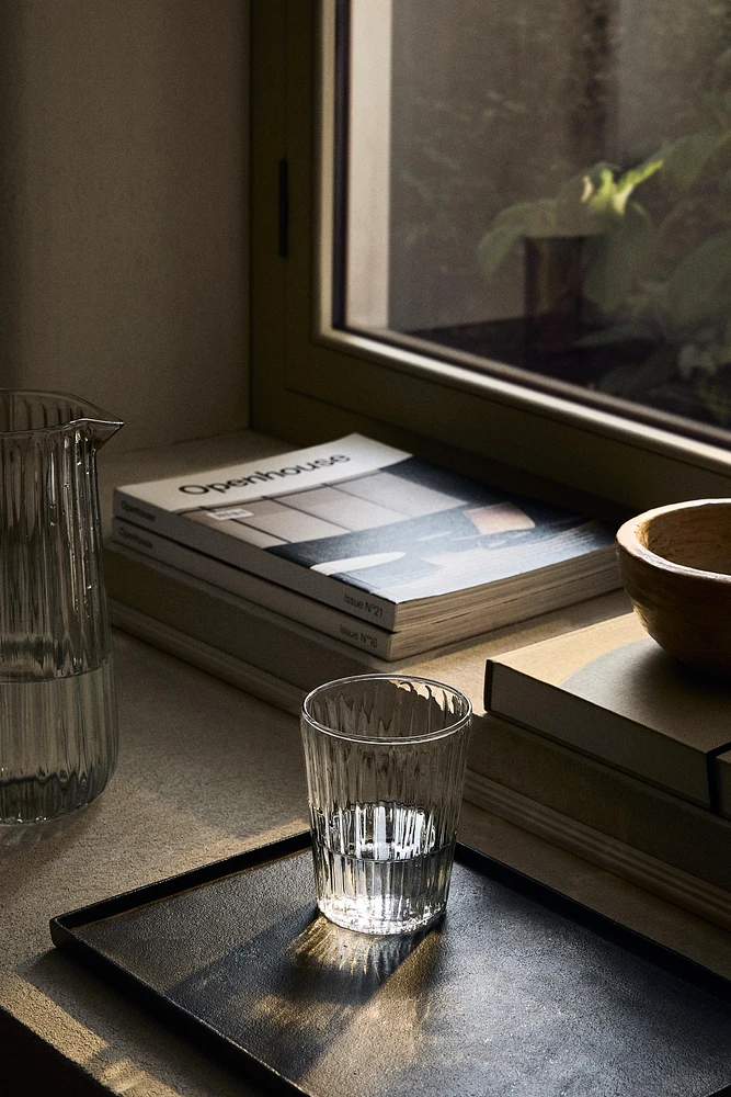 RAISED DESIGN GLASS TUMBLER