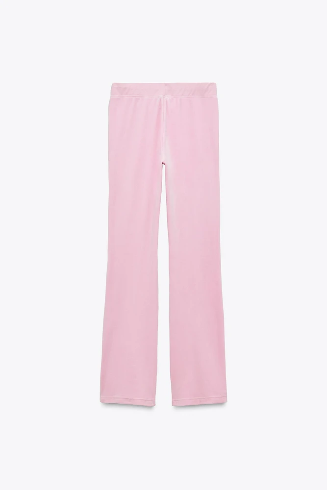 PANTALON EN VELOURS AVEC INSCRIPTION