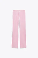 PANTALON EN VELOURS AVEC INSCRIPTION