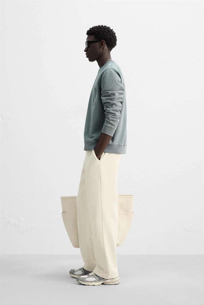 CREW NECK POCKET SWEATSHIRT