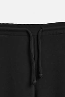 PANTALON WIDE FIT STRUCTURE INTERLOCK
