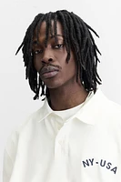 POLO WITH CONTRASTING SIDE STRIPE