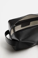 TROUSSE EN CUIR