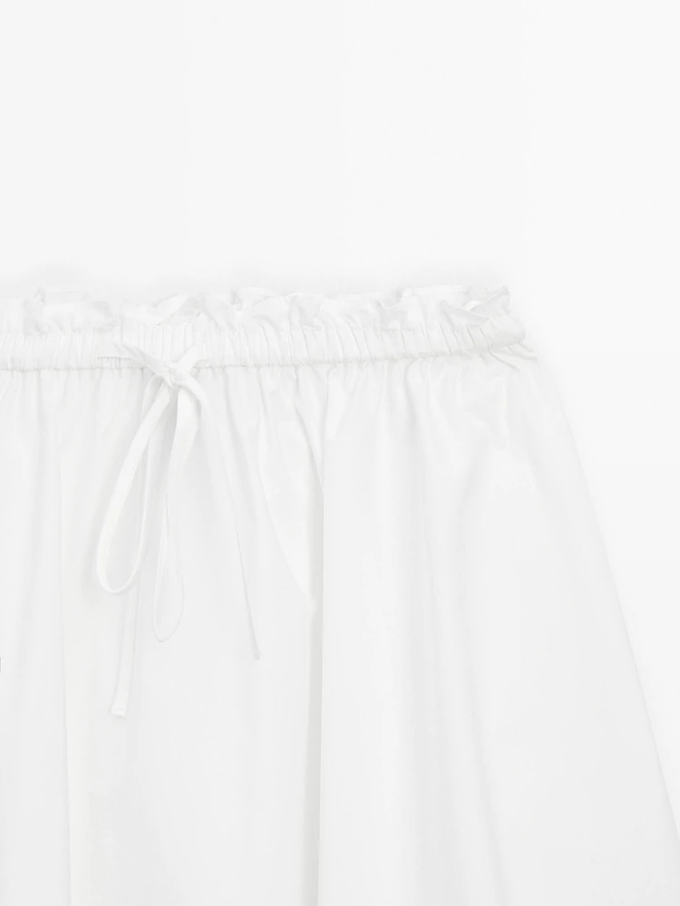 Jupe midi asymétrique fluide