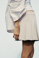 JUPE-SHORT À PLIS PLATS