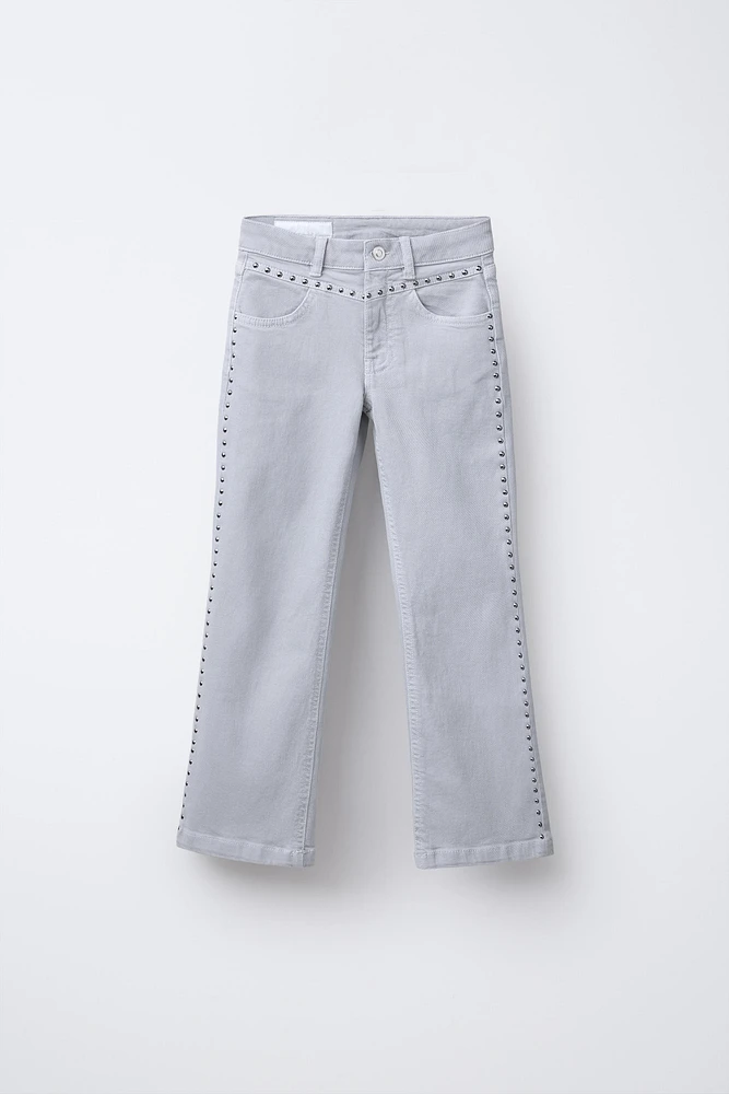 STUDDED FLARE JEANS