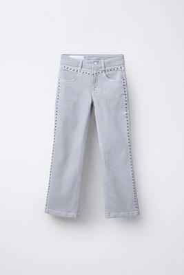 STUDDED FLARE JEANS
