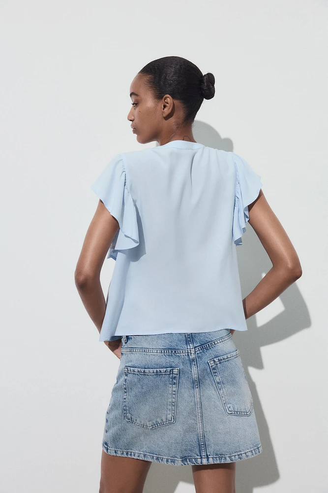 SHORT SLEEVE RUFFLE SHIRT
