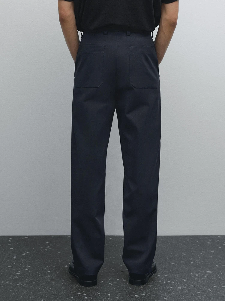 Slim fit cotton blend trousers.