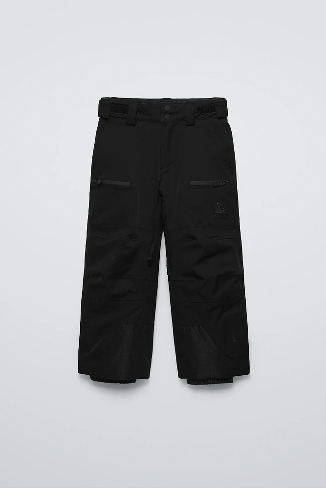 PANTALON COUPE-VENT ET DÉPERLANT RECCO® SYSTEM SKI COLLECTION