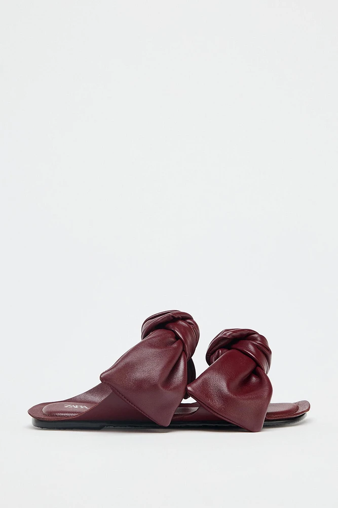 LEATHER BOW SANDALS