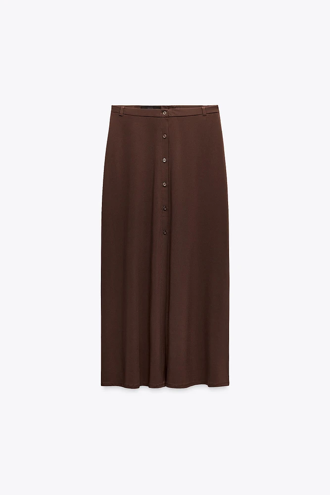 JUPE MI-LONGUE À BOUTONS