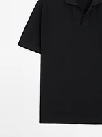 Polo manches courtes en maille texturée
