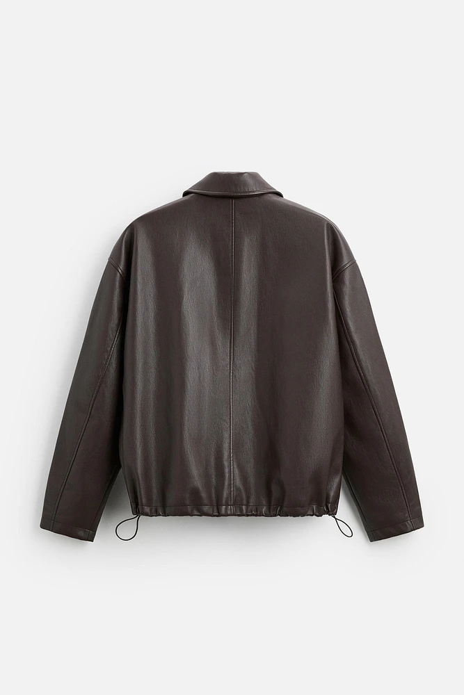BLOUSON EN MATIÈRE SYNTHÉTIQUE