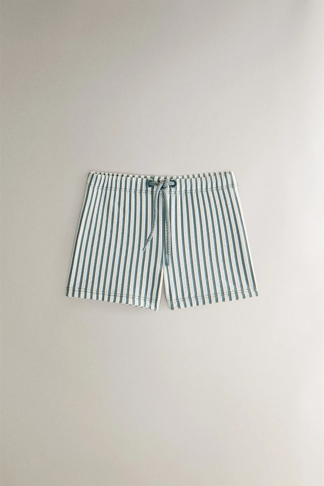 CHILDREN’S STRIPED BEACH SWIMMING TRUNKS
