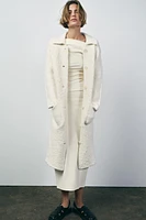 MANTEAU EN MAILLE AVEC LAINE
